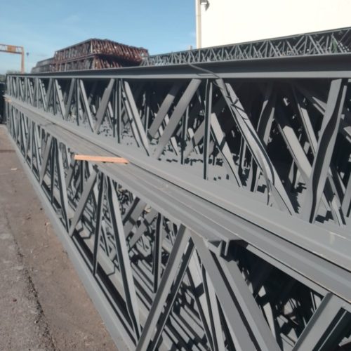 Close view of steel joist chords and diagonal web members