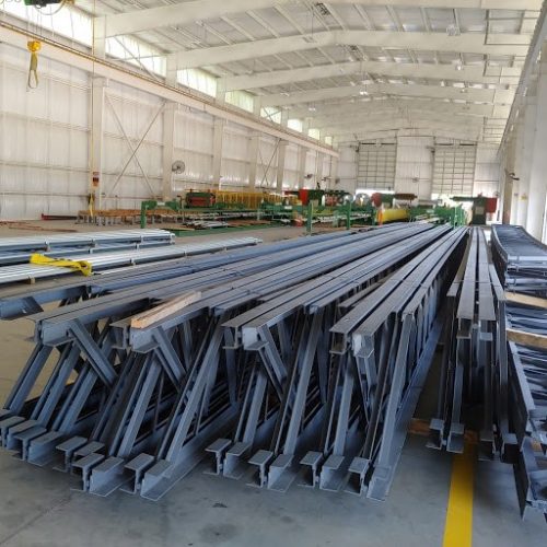 Steel joist bundles inside a manufacturing building